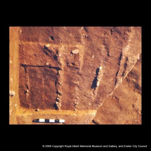 The timber corduroy underlying the rampart