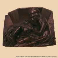 Misericord showing a woman picking nits from her daughter’s hair