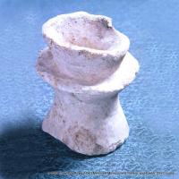A Norman stone lamp