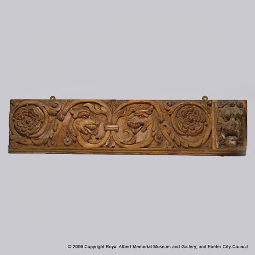 A carved board from 170–1 Fore Street