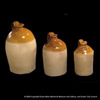 Three stoneware flagons