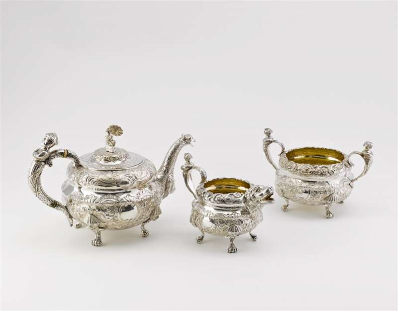 This teapot is part of a three-piece silver tea service. What do you think the other two pieces are for?