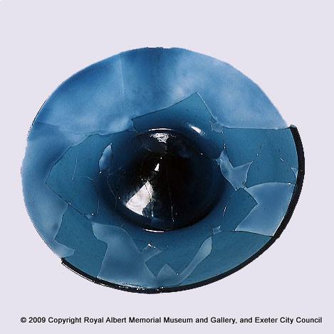 A blue glass dish imported from Venice